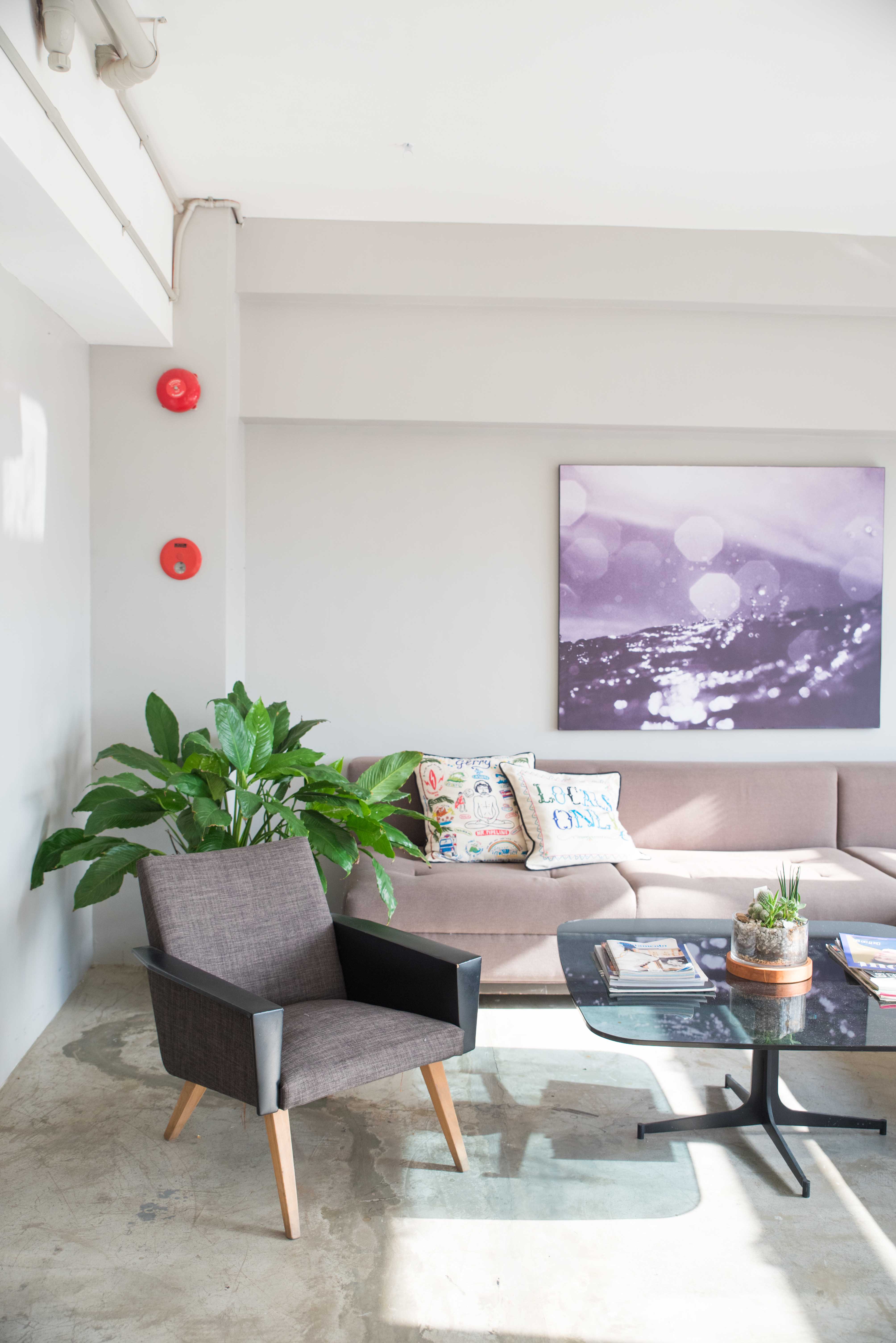 Tenant Manila brings the beach indoors with images of the sea hung around their space. Ample space and sunlight adds to the mood.