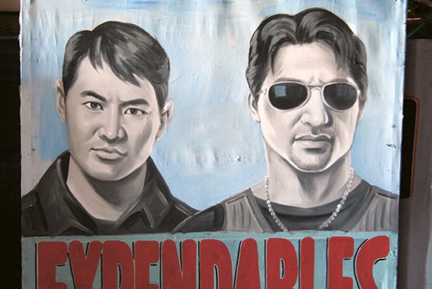 A hand-painted movie billboard of The Expendables