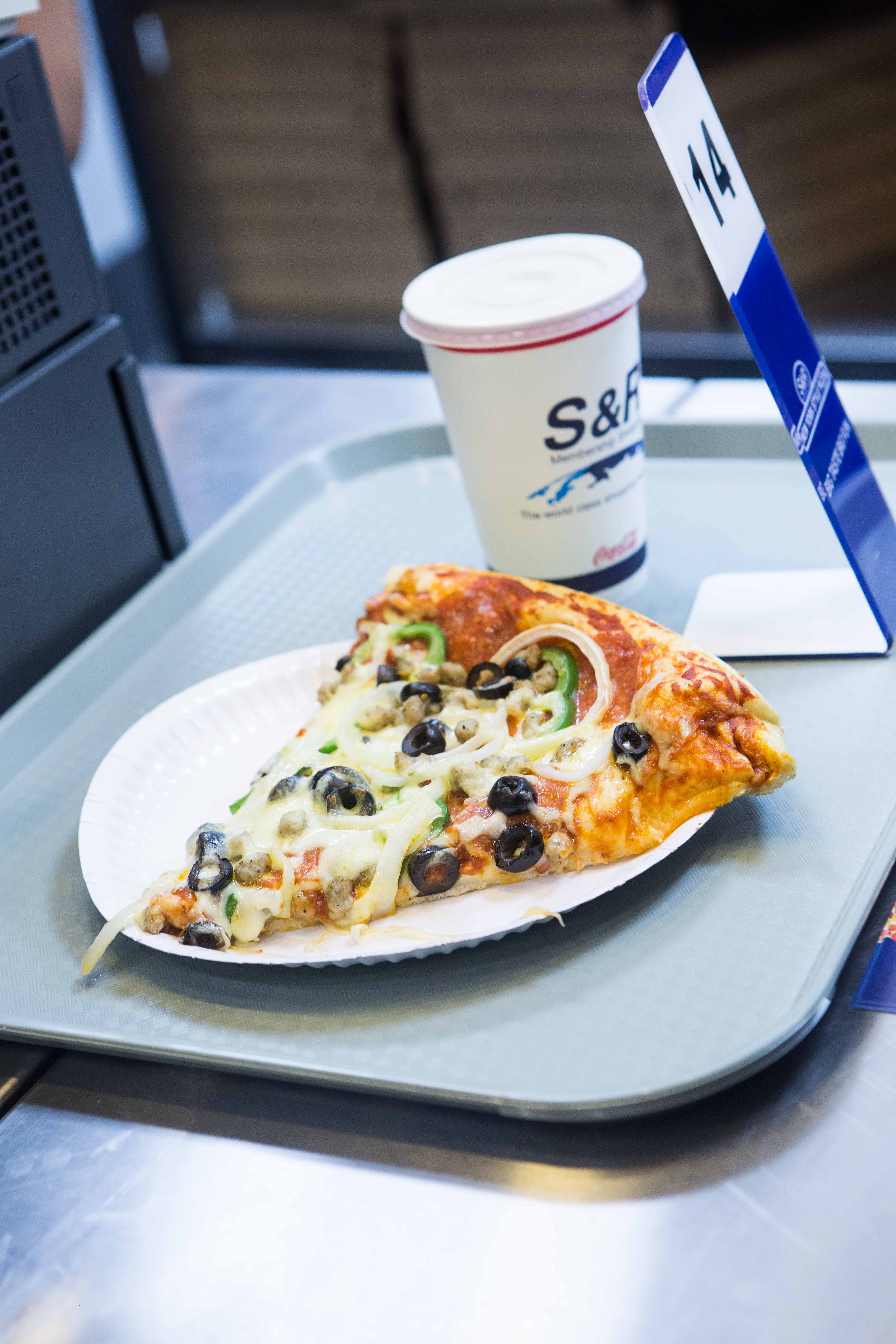 The Combo, which features a generous layer of sauce and cheese, is topped with meat bits, pepperoni, onions, green peppers, and olives. One slice costs P190, while a whole pizza costs P629.