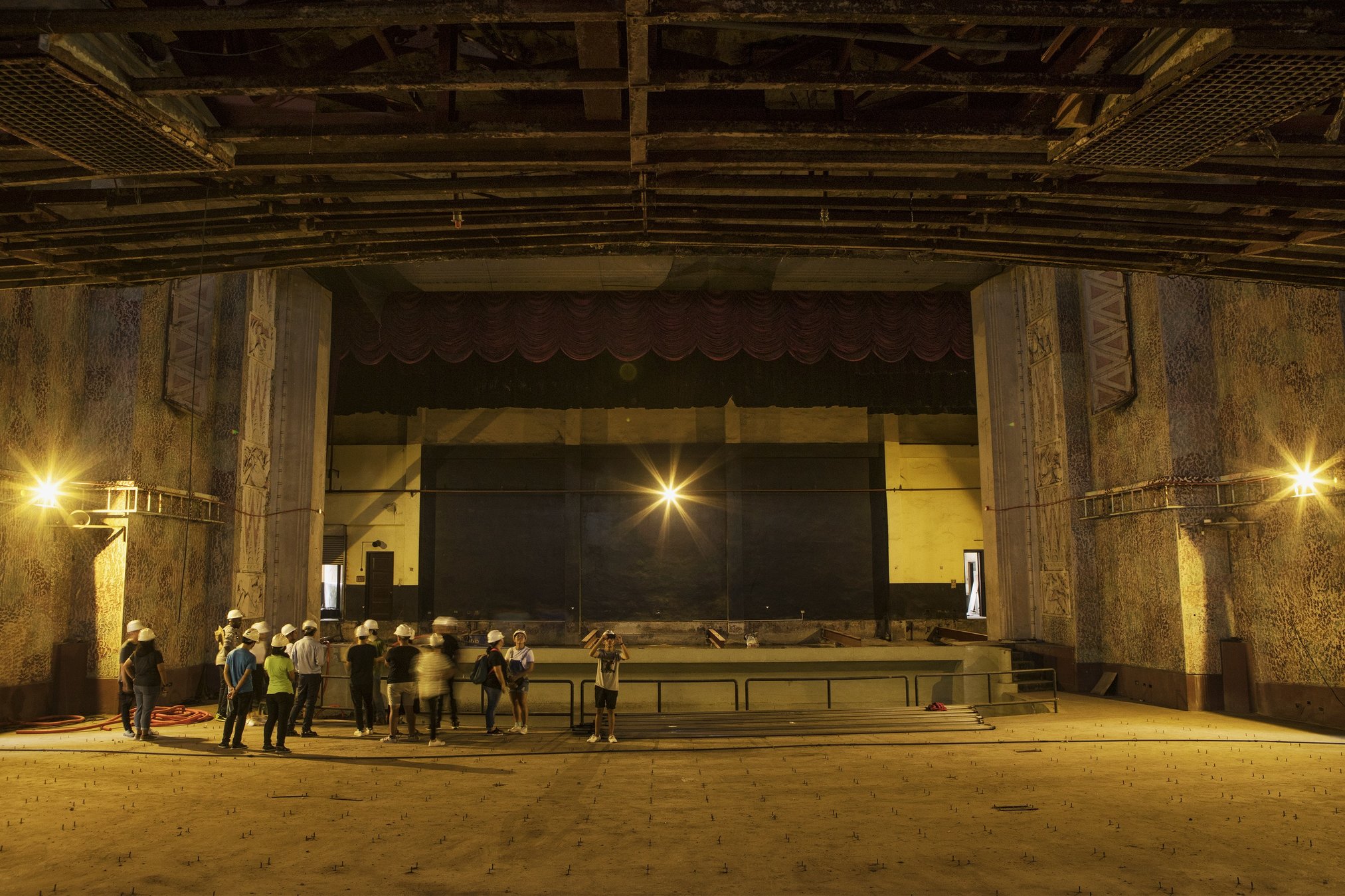 The proscenium features figures depicting Music, Tragedy, Comedy, and Poetry.