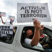 junk terror bill protest