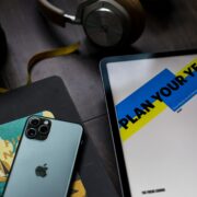 desk with new years resolution essentials planner phone