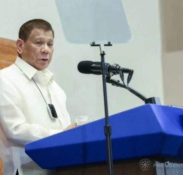 Philippine President Rodrigo Duterte on the podium delivering a speech