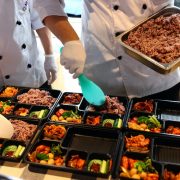 chefs preparing bento meals
