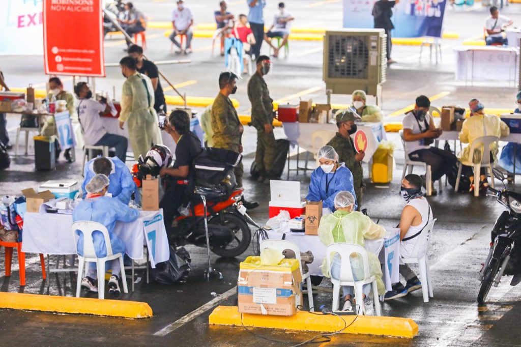 PUV drivers at a vaccine express drive in Novaliches organized by the Office of the Vice President