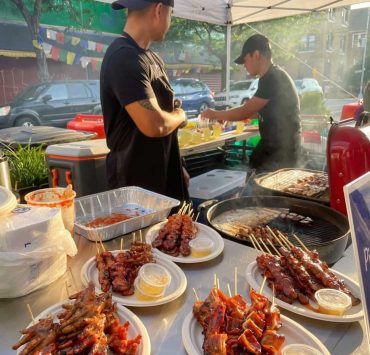 filipino barbecue stall selling grilled skewered innards