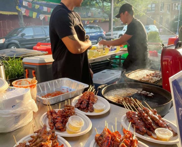 filipino barbecue stall selling grilled skewered innards