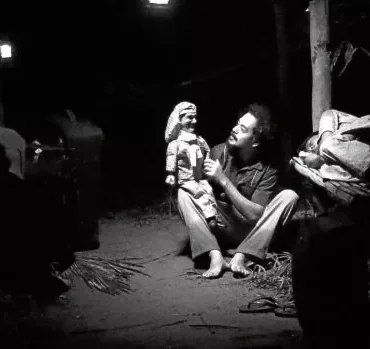 john lloyd cruz in lav diaz’s history of ha talking to his puppet Ha