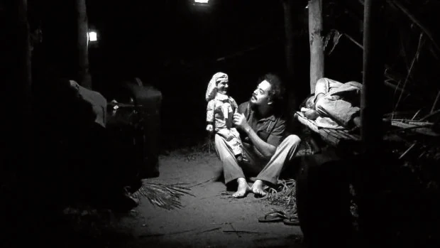 john lloyd cruz in lav diaz’s history of ha talking to his puppet Ha