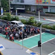 vehicles before a bike box at a red light intersection