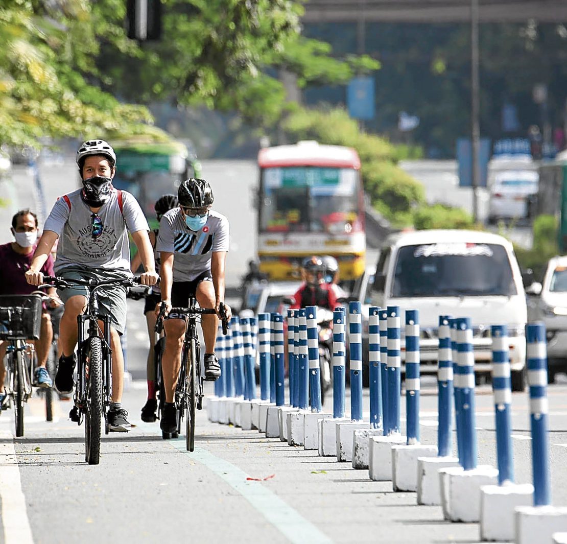 cyclists taking the bike lane in metro manila