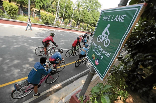 cyclists on a bike lane in san juan city