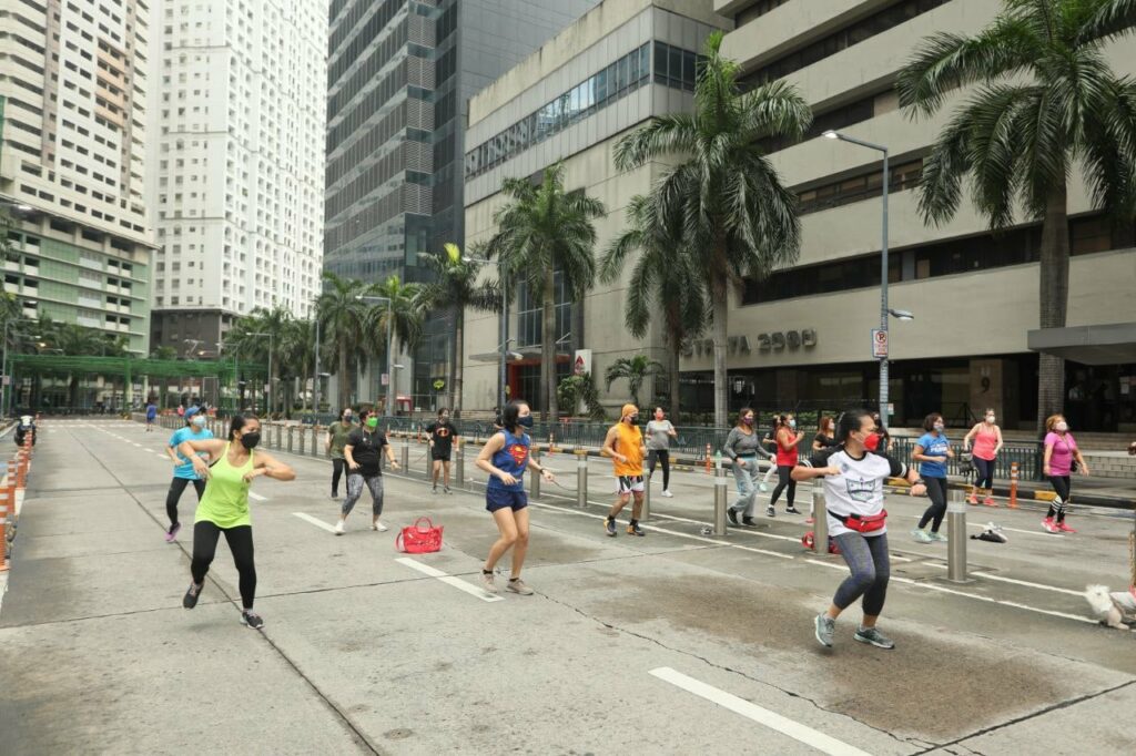 zumba dancers on an empty ortigas street