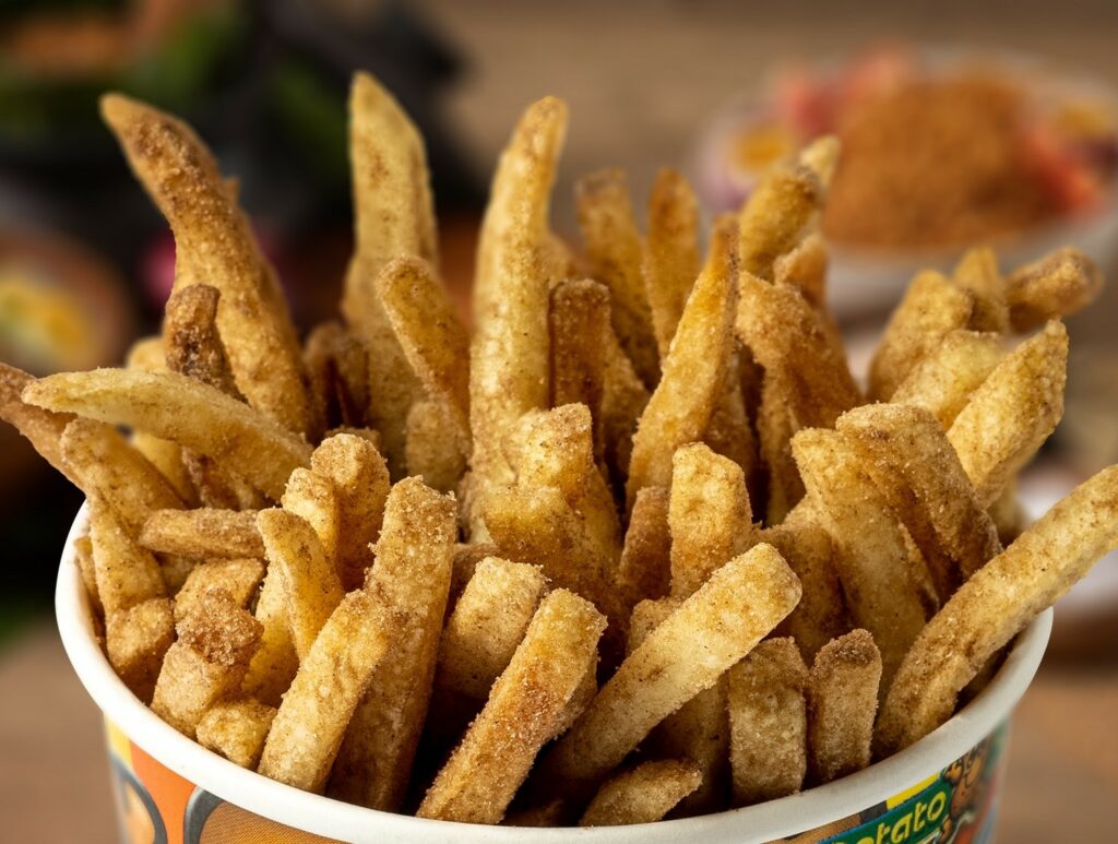 a bucket of adobo fries