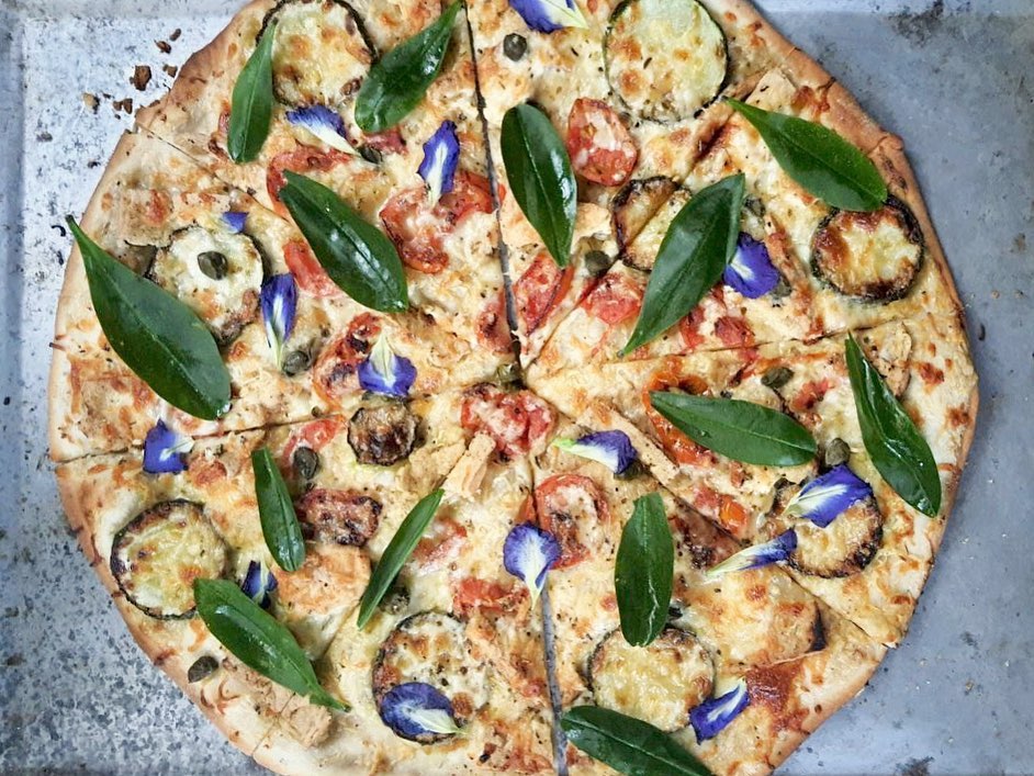 talinum pizza with butterfly pea flowers