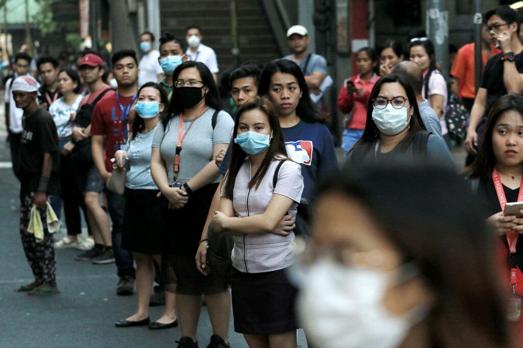 Commuters wear face masks as they wait for their rides along Taft Avenue in Manila amid the threat of the novel coronavirus, a day after the Philippines confirmed its first case of the virus on Thursday, January 30. #CoronavirusPH 📸Richard A. Reyes/PDI