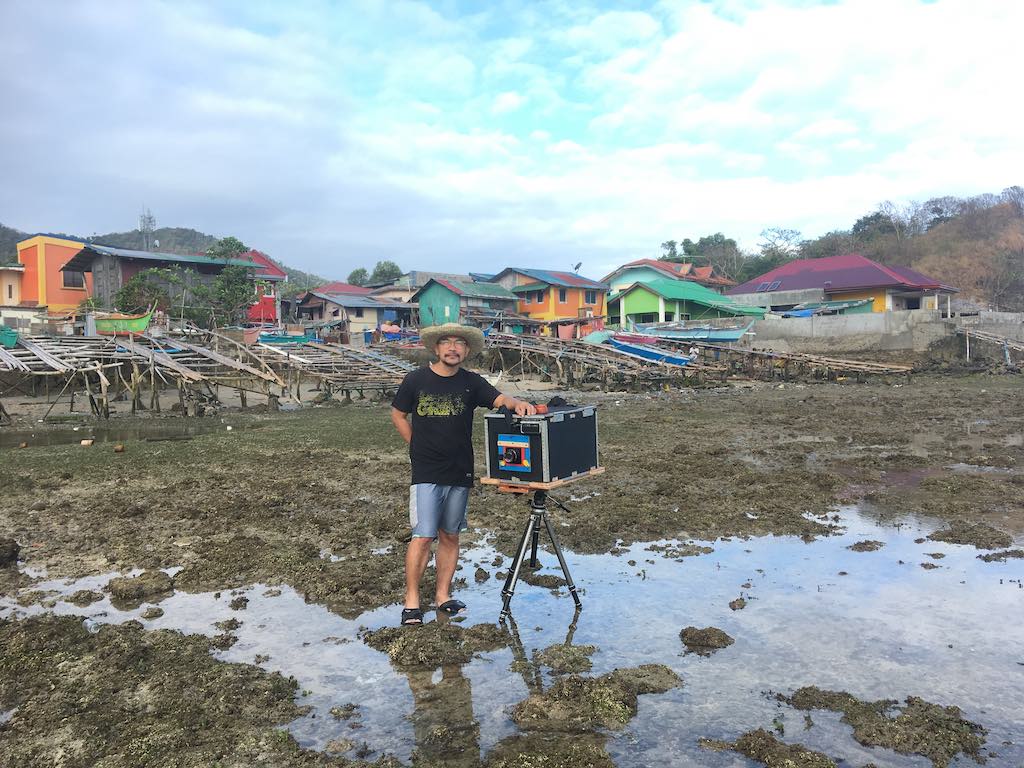 Jovel Lorenzo with another street box camera that he also created.