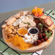 charcuterie board with local meats and cheeses