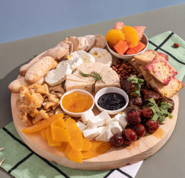 charcuterie board with local meats and cheeses
