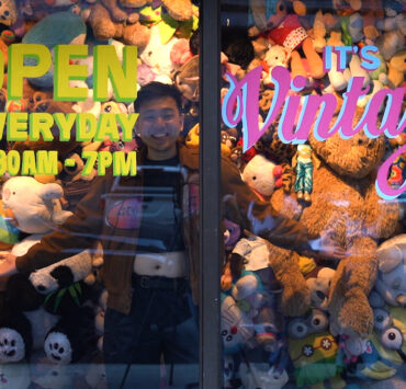 it’s vintage makati vintage shop with owner and creative director fed pua inside the store’s plush toy window display